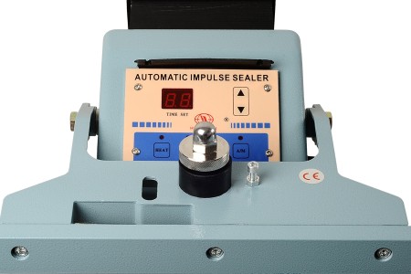 Podna (horizontalna) mašina za termičko zatvaranje sa papučicom za DoyPack kesice - dužina lepljenja 47 cm, širina 1 cm-grupa_slika