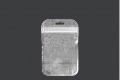 Plastična zip kesica 85x130mm sa srebrnom non woven zadnjom stranom i providnom prednjom stranom kao i eurohole otvorom - 100kom