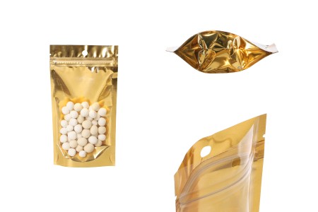 Aluminijumske DoyPack kesice 100x30x180mm sa zip zatvaranjem, zlatnom zadnjom i transparentnom prednjom stranom, ovalnim dnom i sa mogućnošću termo lepljenja – 100kom-slika_proizvoda