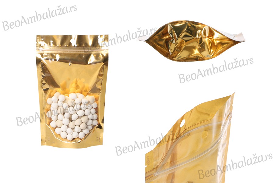 Aluminijumske DoyPack kesice sa zip zatvaranjem, zlatnom zadnjom i transparentnom prednjom stranom, ovalnim dnom i sa mogućnošću termo lepljenja 130x40x205mm – 100kom