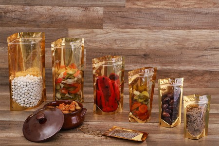 Aluminijumske DoyPack kesice sa zip zatvaranjem, zlatnom zadnjom i transparentnom prednjom stranom, ovalnim dnom i sa mogućnošću termo lepljenja 90x30x140mm – 100kom-grupa_slika