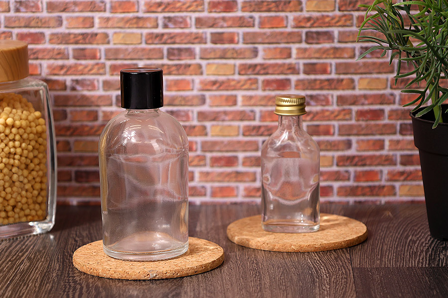 Staklena okrugla flašica 100mL (PP 20)