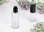 Staklena bočica 100 ml providna sa crnom pumpicom za kremu i poklopcem