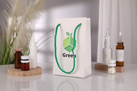 Papirna bela poklon kesa 110x60x180mm sa zelenom drškom - 20 kom-grupa_slika