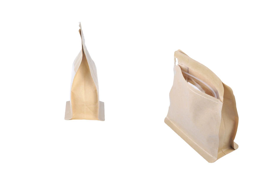 Kraft DoyPack 137x66x123mm - 50 kom vrećica na termo zatvaranje, sa prozorom, sigurnosnom tračicom i zipom, spoljnom i unutrašnjom providnom oblogom i četvrtastim dnom -