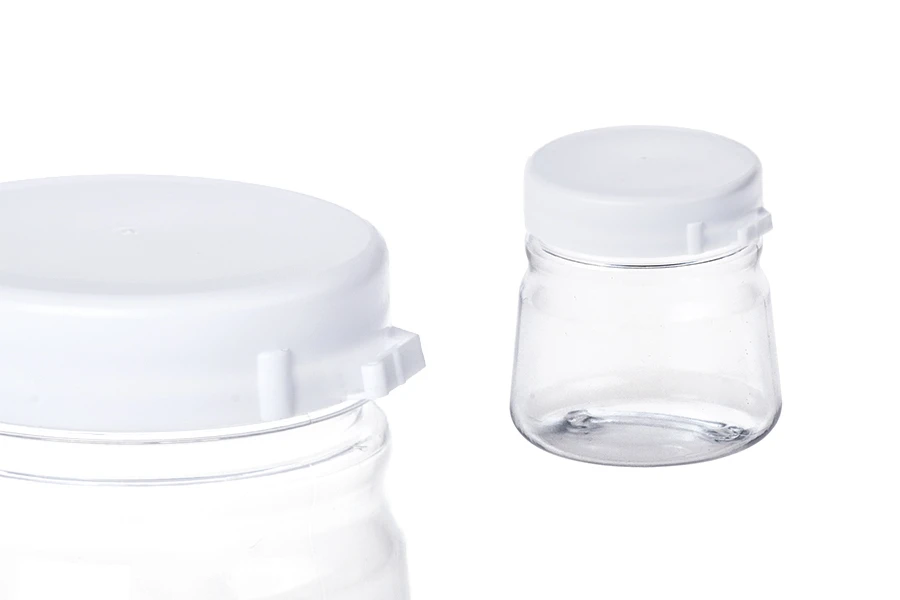 Plastična providna kutijica 50mL sa belim sigurnosnim zatvaračem - 12 kom Plastična providna kutijica 50mL sa belim sigurnosnim zatvaračem - 12 kom