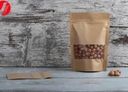 Kraft DoyPack kesice 140x40x200mm sa zip zatvaranjem i prozorom, unutrašnjom i spoljašnjom providnom oblogom, ovalnim dnom i sa mogućnošću termo zatvaranja – 100kom Kraft DoyPack kesice 140x40x200mm sa zip zatvaranjem i prozorom, unutrašnjom i spoljašnjom providnom oblogom, ovalnim dnom i sa mogućnošću termo zatvaranja – 100kom