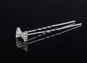 Dekorativna metalna ukosnica sa kamenčićima, u obliku mašne (širina 14 mm, visina 9 mm) - 20 kom