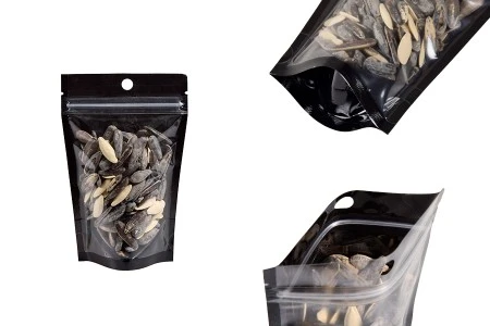 Aluminijumske DoyPack kesice sa zip zatvaranjem, crnom zadnjom i transparentnom prednjom stranom, ovalnim dnom i sa mogućnošću termo lepljenja 90x30x140mm - 100kom-1