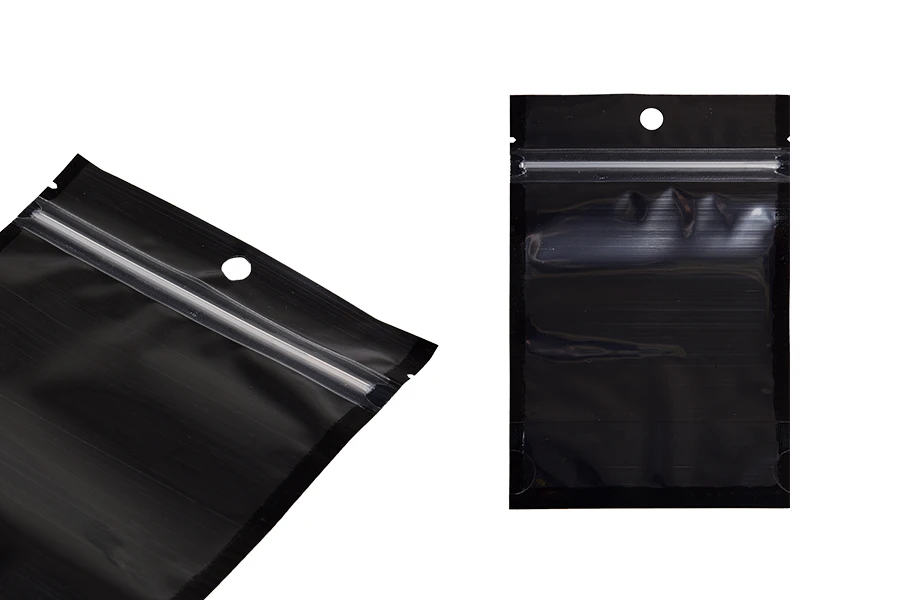 Aluminijumske DoyPack kesice sa zipom, crnom zadnjom i transparentnom prednjom stranom, ovalnim dnom i sa mogućnošću termo zatvaranja 100x30x150mm - 100kom