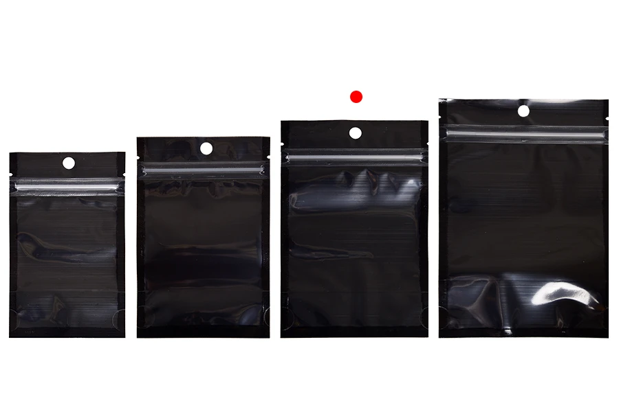 Aluminijumske DoyPack kesice sa zipom, crnom zadnjom i transparentnom prednjom stranom, ovalnim dnom i sa mogućnošću termo zatvaranja 100x30x150mm - 100kom