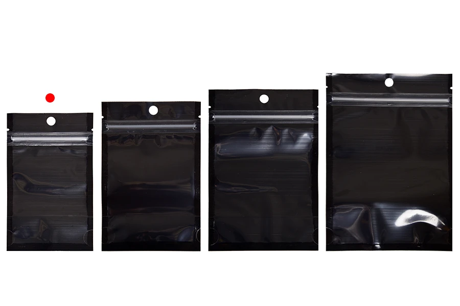 Aluminijumske DoyPack kesice sa zipom, crnom zadnjom i transparentnom prednjom stranom, ovalnim dnom i sa mogućnošću termo zatvaranja 80x30x130mm - 100kom Aluminijumske DoyPack kesice sa zipom, crnom zadnjom i transparentnom prednjom stranom, ovalnim dnom i sa mogućnošću termo zatvaranja 80x30x130mm - 100kom