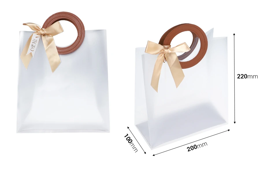 Plastična poluprovidna poklon torbica 200x100x220 mm sa mašnom i kožnim ručkama - 12 kom Plastična poluprovidna poklon torbica 200x100x220 mm sa mašnom i kožnim ručkama - 12 kom-dimenzije_slike
