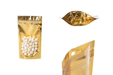 Aluminijumske DoyPack kesice sa zip zatvaranjem, zlatnom zadnjom i transparentnom prednjom stranom, ovalnim dnom i sa mogućnošću termo lepljenja 100x30x180mm – 100kom-1