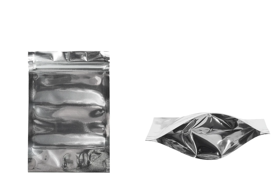 Aluminijumske DoyPack kesice 100x30x150mm sa zipom, transparentnom prednjom stranom, ovalnim dnom i sa mogućnošću termo zatvaranja – 100kom Aluminijumske DoyPack kesice 100x30x150mm sa zipom, transparentnom prednjom stranom, ovalnim dnom i sa mogućnošću termo zatvaranja – 100kom