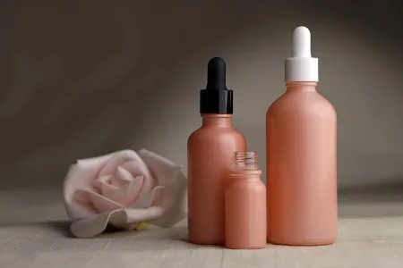 Staklena MAT roze bočica za etarska ulja 100mL, sa grlom PP18-3