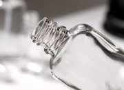 Staklena ovalna providna bočica za etarska ulja 10mL, sa grlom PP18