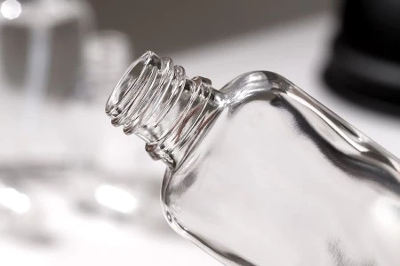 Staklena ovalna providna bočica za etarska ulja 10mL, sa grlom PP18-5