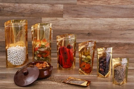 Aluminijumske DoyPack kesice sa zip zatvaranjem, zlatnom zadnjom i transparentnom prednjom stranom, ovalnim dnom i sa mogućnošću termo lepljenja  200x50x300mm – 100kom-6