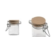 Staklena okrugla teglica 40mL sa drvenim poklopcem sa hermetičkim zatvaranjem (žicom i gumicom na poklopcu) Staklena okrugla teglica 40mL sa drvenim poklopcem sa hermetičkim zatvaranjem (žicom i gumicom na poklopcu)