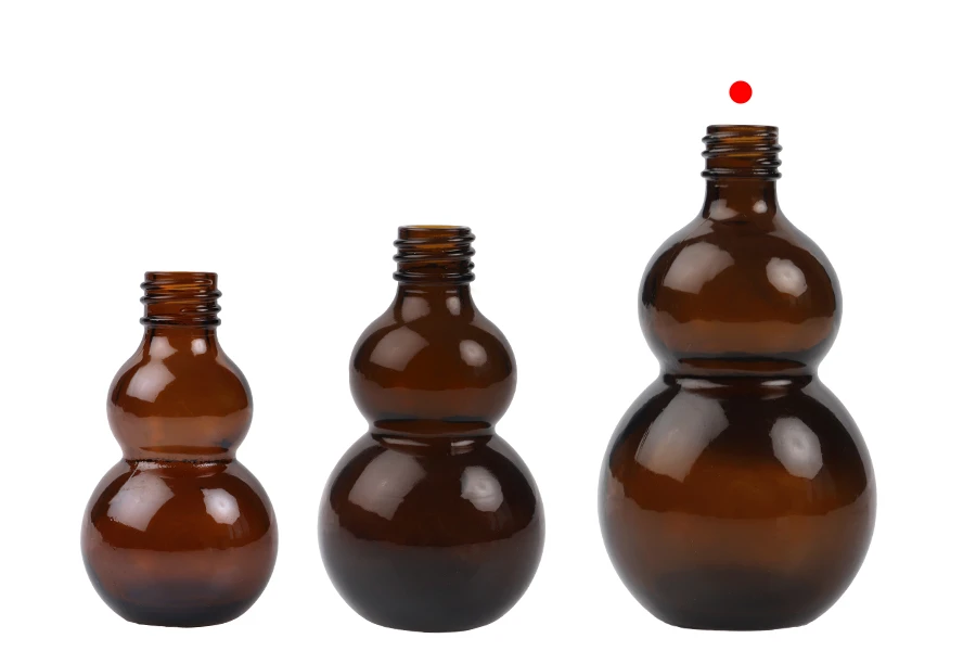 Staklena zaobljena braon bočica 100mL, za etarsko ulje (PP18) Staklena zaobljena braon bočica 100mL, za etarsko ulje (PP18)