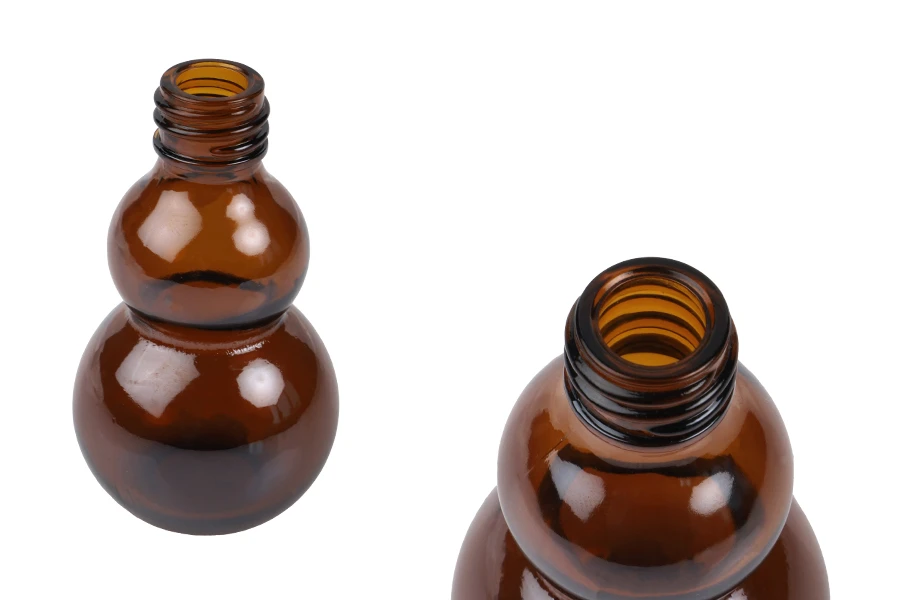 Staklena zaobljena braon bočica 30mL, za etarsko ulje (PP18)