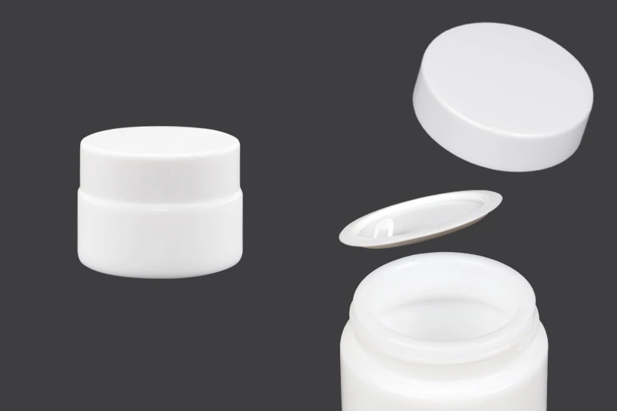 Staklena bela teglica za kreme 15mL, sa zaptivkom u belom plastičnom zatvaraču i međupoklopcem Staklena bela teglica za kreme 15mL, sa zaptivkom u belom plastičnom zatvaraču i međupoklopcem