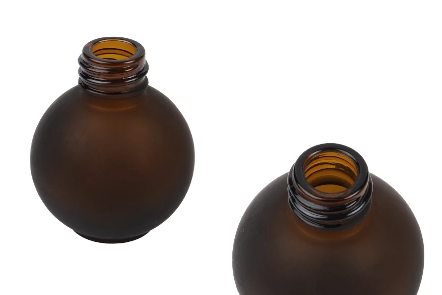 Peskirana okrugla braon staklena bočica 20mL, PP18 - bez zatvarača Peskirana okrugla braon staklena bočica 20mL, PP18 - bez zatvarača
