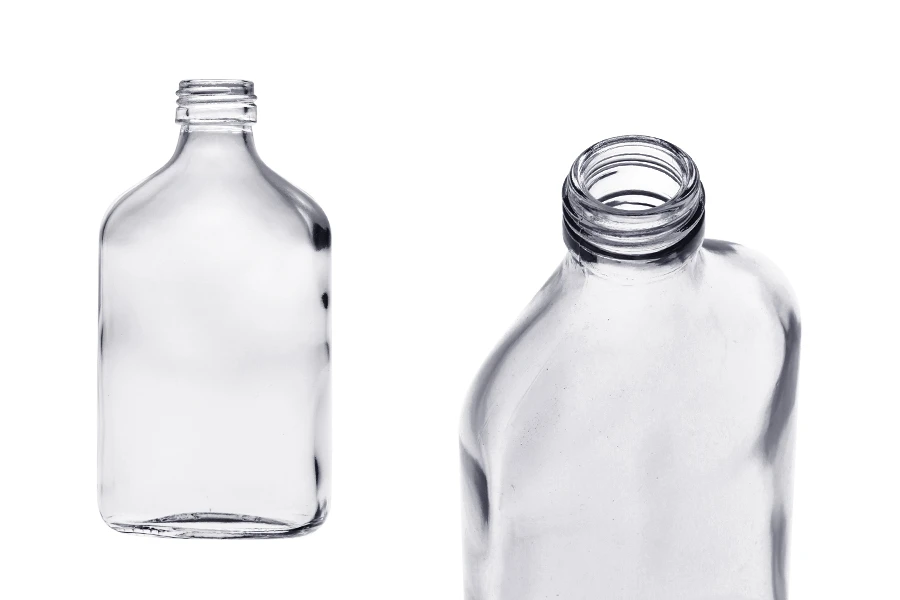 Staklena pljosnata obla flaša 200mL - 40 kom Staklena pljosnata obla flaša 200mL - 40 kom