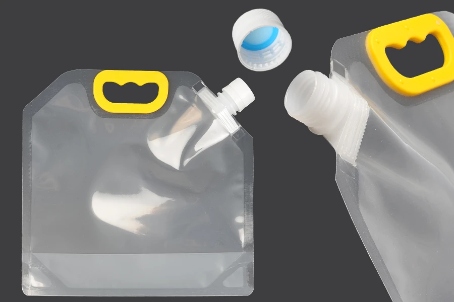 DoyPack kesica za tečnosti 2 L providna sa belim sigurnosnim zatvaračem i ručkom – 10 kom DoyPack kesica za tečnosti 2 L providna sa belim sigurnosnim zatvaračem i ručkom – 10 kom