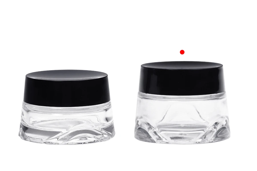 Staklena teglica 50 ml providna za kremu sa crnim zatvaračem i plastičnim međupoklopcem Staklena teglica 50 ml providna za kremu sa crnim zatvaračem i plastičnim međupoklopcem