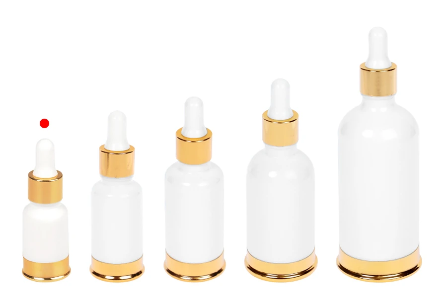 Staklena bela bočica 10mL sa pipetom i zlatnim aluminijumskim prstenom i osnovom Staklena bela bočica 10mL sa pipetom i zlatnim aluminijumskim prstenom i osnovom