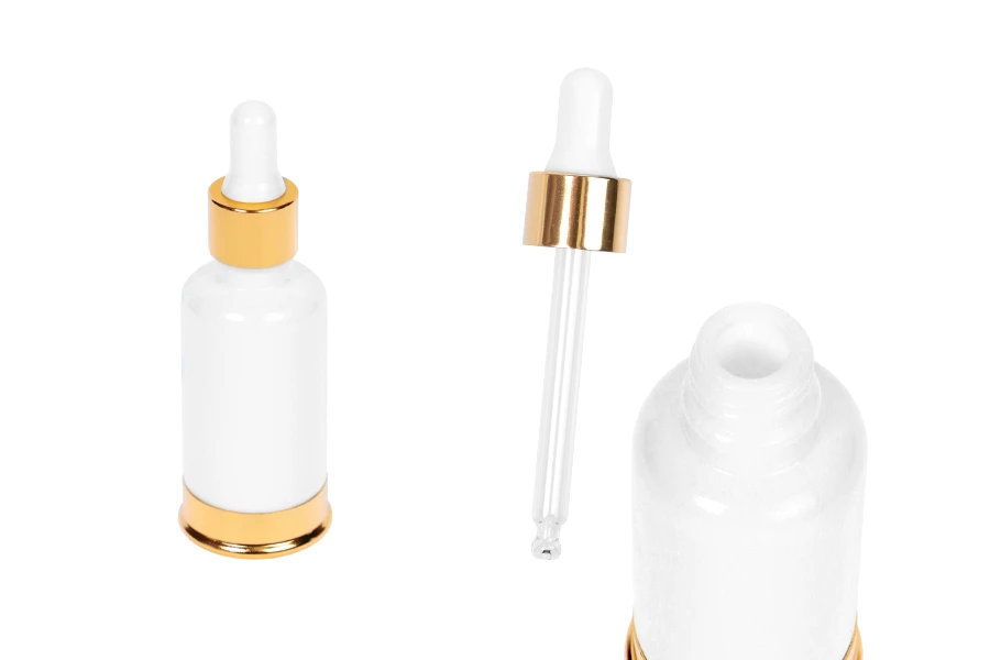 Staklena bela bočica 30mL sa pipetom i aluminijumskom zlatnom osnovom Staklena bela bočica 30mL sa pipetom i aluminijumskom zlatnom osnovom