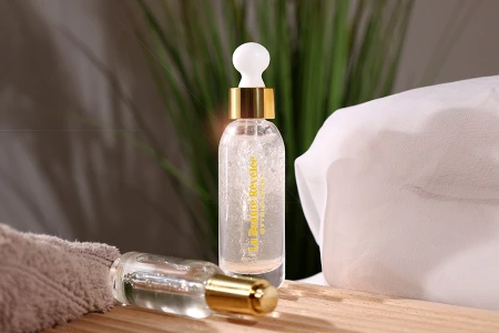 Staklena bočica 50mL sa zlatnom pipetom-grupa_slika