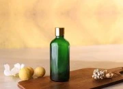 Zelena staklena bočica za etarska ulja 100mL, sa grlom PP18