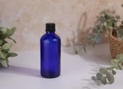 Plava staklena bočica za etarska ulja 100mL, sa grlom PP18 - bez zatvarača