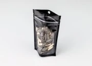 Aluminijumske DoyPack kesice sa zip zatvaranjem, crnom zadnjom i transparentnom prednjom stranom, ovalnim dnom i sa mogućnošću termo lepljenja 90x30x140mm - 100kom