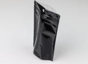 Aluminijumske DoyPack kesice sa zipom, crnom zadnjom i transparentnom prednjom stranom, ovalnim dnom i sa mogućnošću termo zatvaranja 120x40x170mm - 100kom