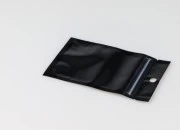 Aluminijumske DoyPack kesice sa zipom, crnom zadnjom i transparentnom prednjom stranom, ovalnim dnom i sa mogućnošću termo zatvaranja 80x30x130mm - 100kom Aluminijumske DoyPack kesice sa zipom, crnom zadnjom i transparentnom prednjom stranom, ovalnim dnom i sa mogućnošću termo zatvaranja 80x30x130mm - 100kom