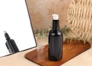 Staklena crna bočica za etarska ulja 100mL, sa grlom PP18