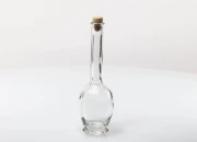 Staklena okrugla flaša sa dugim i uskim grlom 200mL Staklena okrugla flaša sa dugim i uskim grlom 200mL